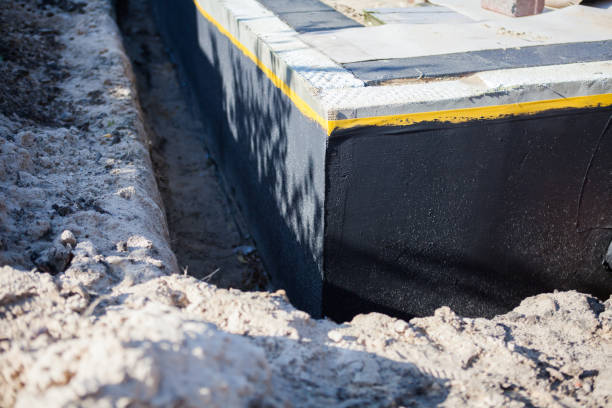 Professional Waterproofing technician working in Avon, PA